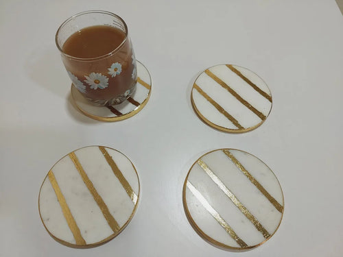 bright gold and white marble coasters